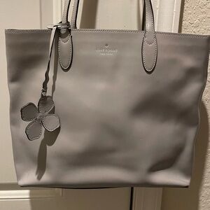 kate spade gray leather tote with floral charm